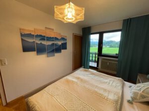 Ferienwohnung Kaiserpanorama Schlafzimmer Bergbild